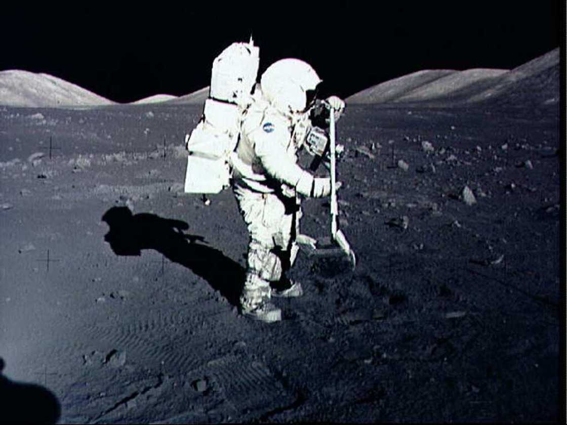 Astronaut Harrison Schmitt collects lunar rake samples at the Taurus-Littrow landing site on the moon during the Apollo 17 mission, America's last lunar landing