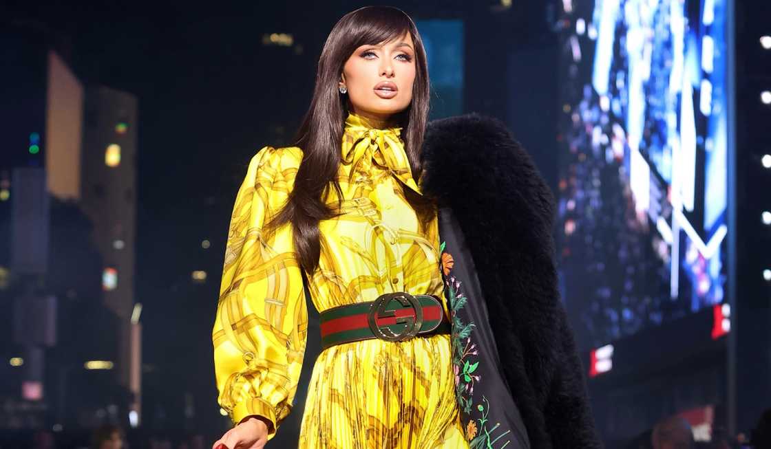 Paris Hilton walks on a Gucci catwalk.