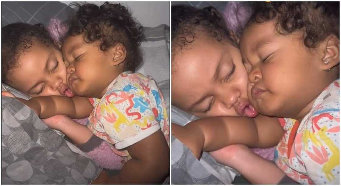 Photos of two babies sleeping on each other. Photos of two babies sleeping on each other.
