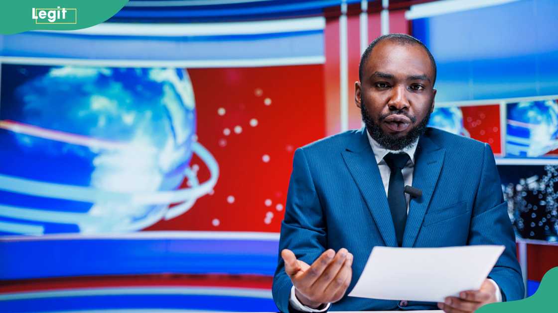 A news anchor delivering breaking news in the newsroom A news anchor delivering breaking news in the newsroom