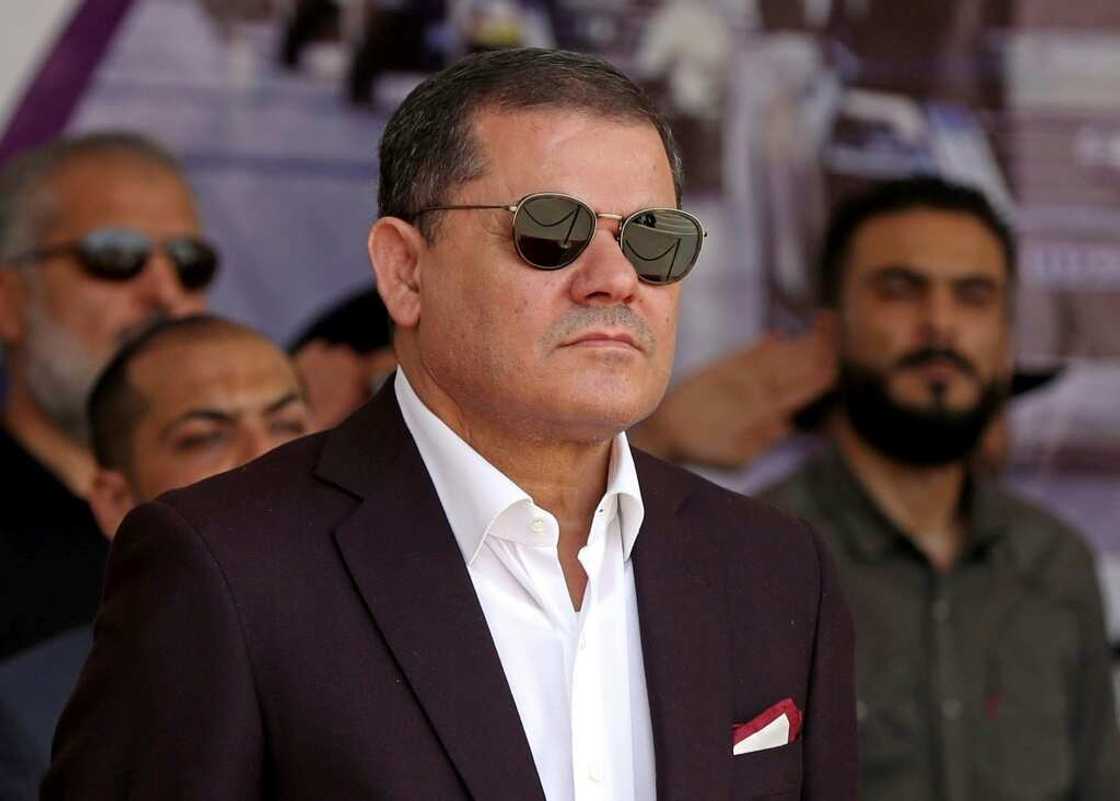 Libya's Tripoli-based prime minister Abdulhamid Dbeibah, seen here attending a military graduation ceremony on July 3 Libya's Tripoli-based prime minister Abdulhamid Dbeibah, seen here attending a military graduation ceremony on July 3
