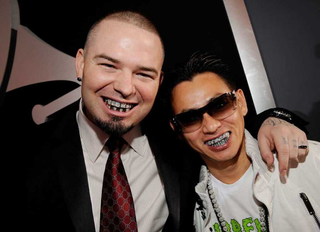 Rapper Paul Wall (L) and Johnny Dang pose for photo (R). Rapper Paul Wall (L) and Johnny Dang pose for photo (R).