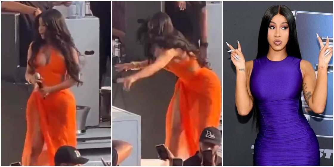 Cardi B hurls microphone at concertgoer who tosses drink at her onstage, Cardi B at Billboard awards Cardi B hurls microphone at concertgoer who tosses drink at her onstage, Cardi B at Billboard awards