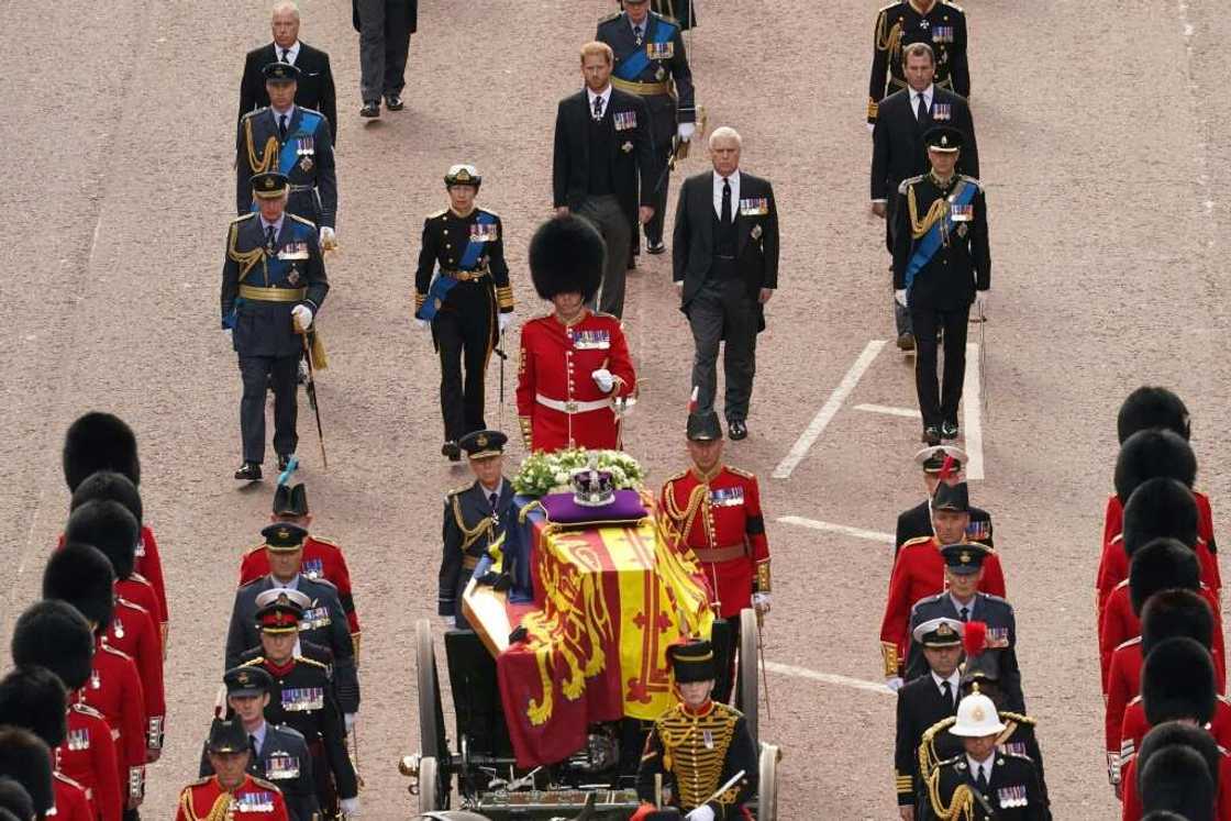 King Charles III led the royal family in procession behind a horse-drawn gun carriage bearing the casket