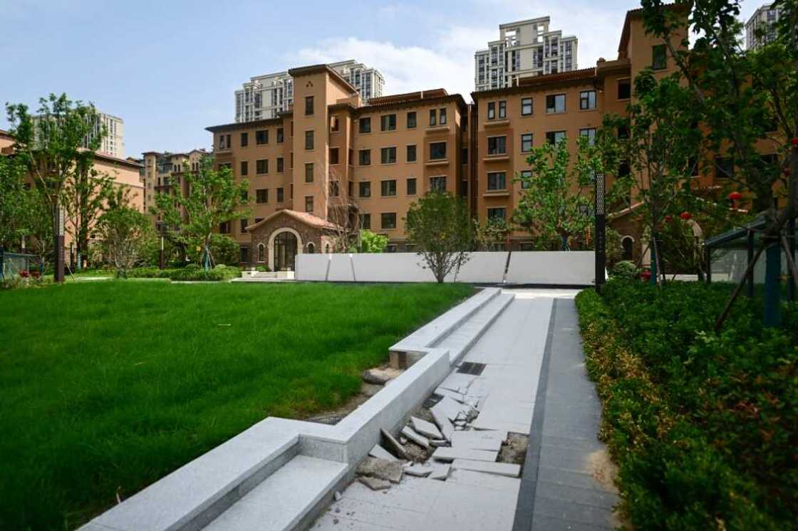 A complex of unfinished apartment buildings in Zhengzhou, in China's central Henan province A complex of unfinished apartment buildings in Zhengzhou, in China's central Henan province