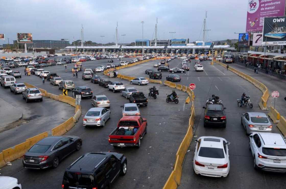 Cars queue to cross to the United States from Tijuana in northwestern Mexico Cars queue to cross to the United States from Tijuana in northwestern Mexico
