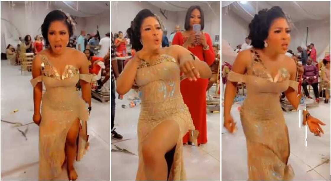 Nigerian bride in beautiful gold reception gown dances aggressively in stunning video Nigerian bride in beautiful gold reception gown dances aggressively in stunning video