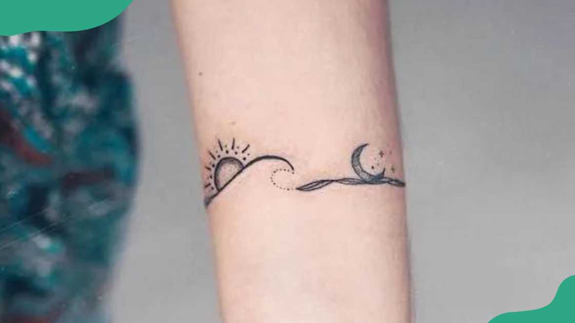 Sun, moon and waves bracelet tattoo