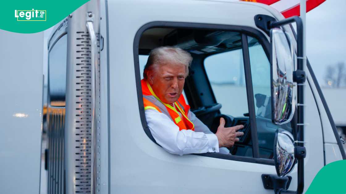 Trump dresses as sanitation worker, slam Biden's "garbage" comment