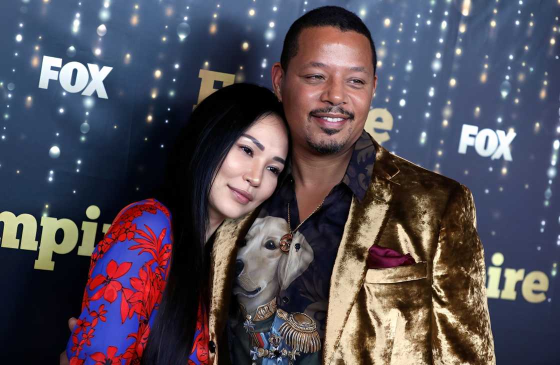 Miranda Pak Howard leans on Terrence Howard