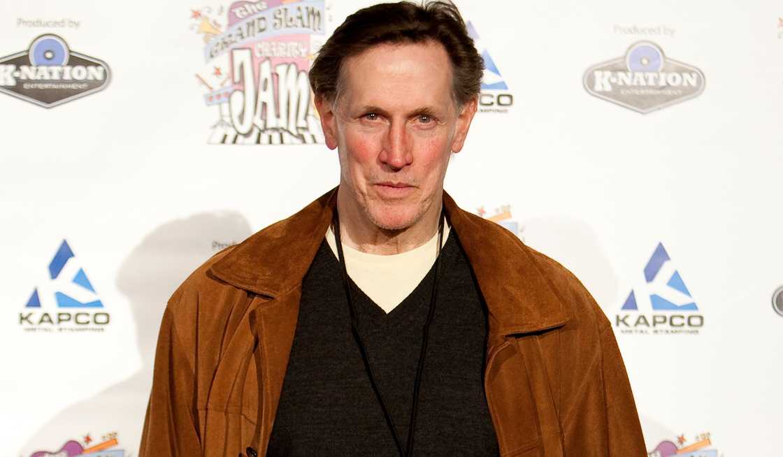 Mark Metcalf poses standing on the red carpet of the 2012 Grand Slam Charity Jam at the Potawatomi Bingo Casino in Milwaukee, Wisconsin. Mark Metcalf poses standing on the red carpet of the 2012 Grand Slam Charity Jam at the Potawatomi Bingo Casino in Milwaukee, Wisconsin.
