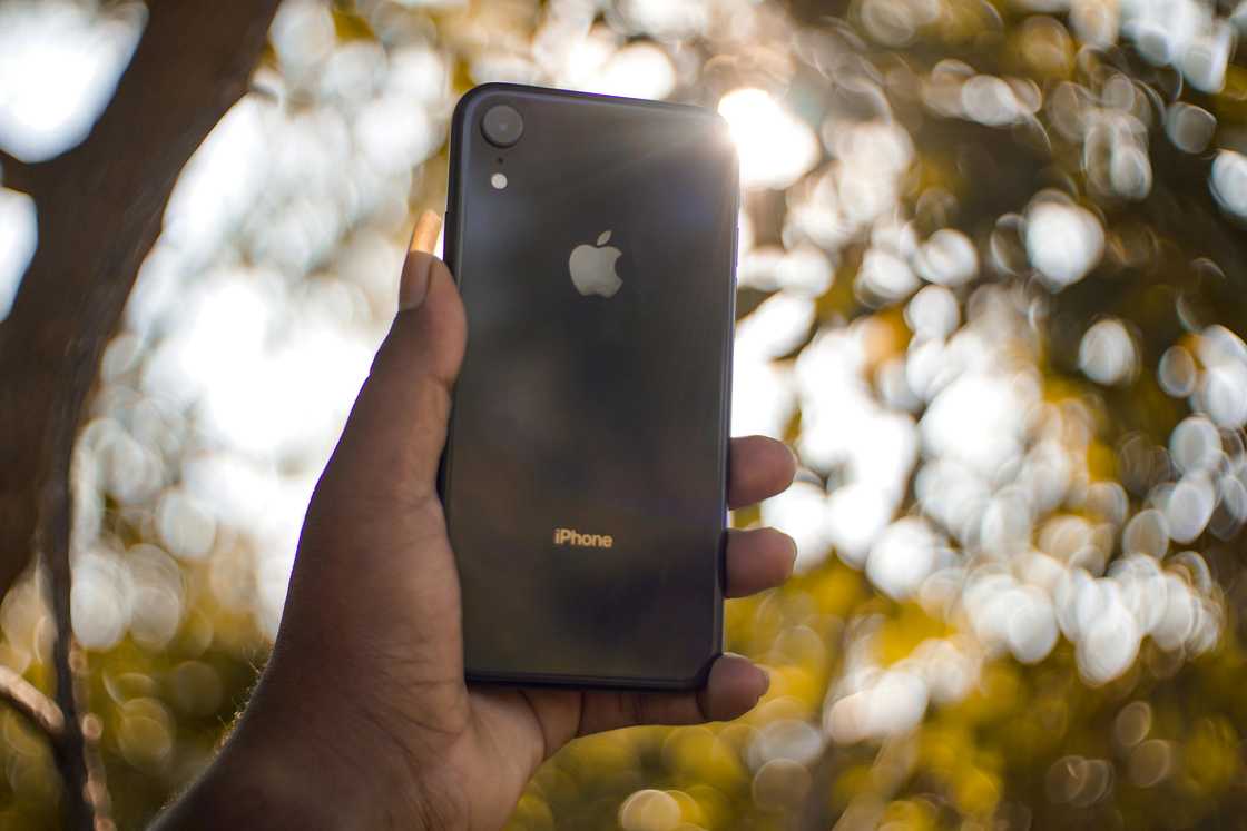 A close-up photo of an iPhone smartphone A close-up photo of an iPhone smartphone