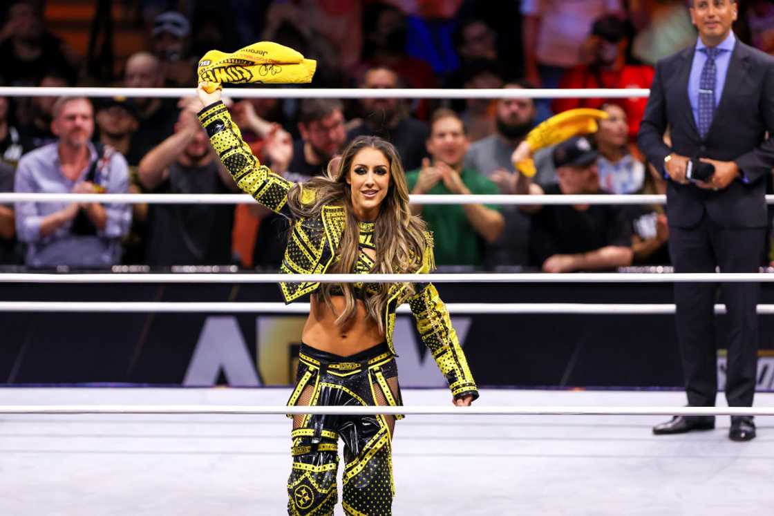 Dr. Britt Baker, D.M.D. waves a Terrible Towel in the ring at the Petersen Events Center