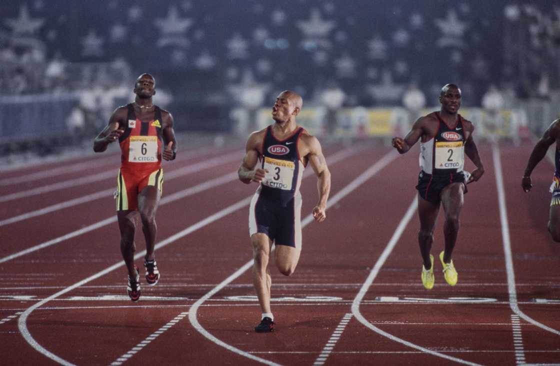 Athletes Maurice Greene (C), Donovan Bailey (L) and Dennis Mitchell (R).