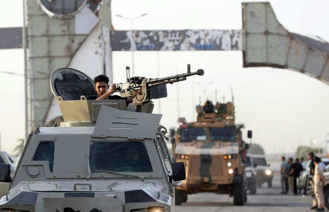 Joint forces affiliated with Libya's Government of National Unity assemble inside the closed Tripoli International Airport on August 16, 2022 Joint forces affiliated with Libya's Government of National Unity assemble inside the closed Tripoli International Airport on August 16, 2022