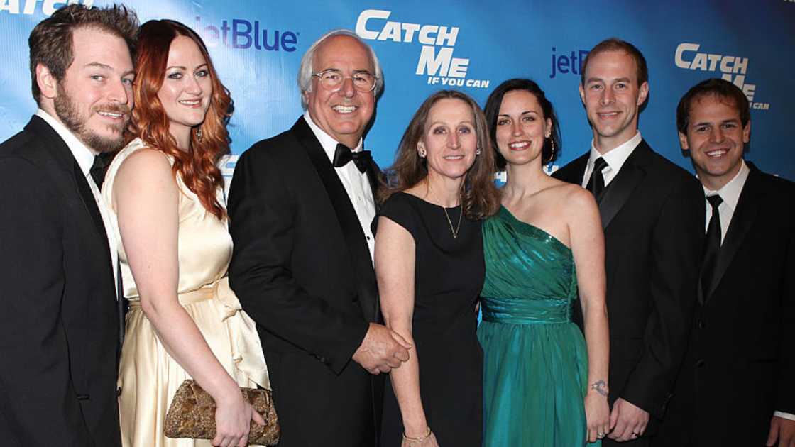 Kelly Anne Welbes with her husband, sons and their wives. Kelly Anne Welbes with her husband, sons and their wives.