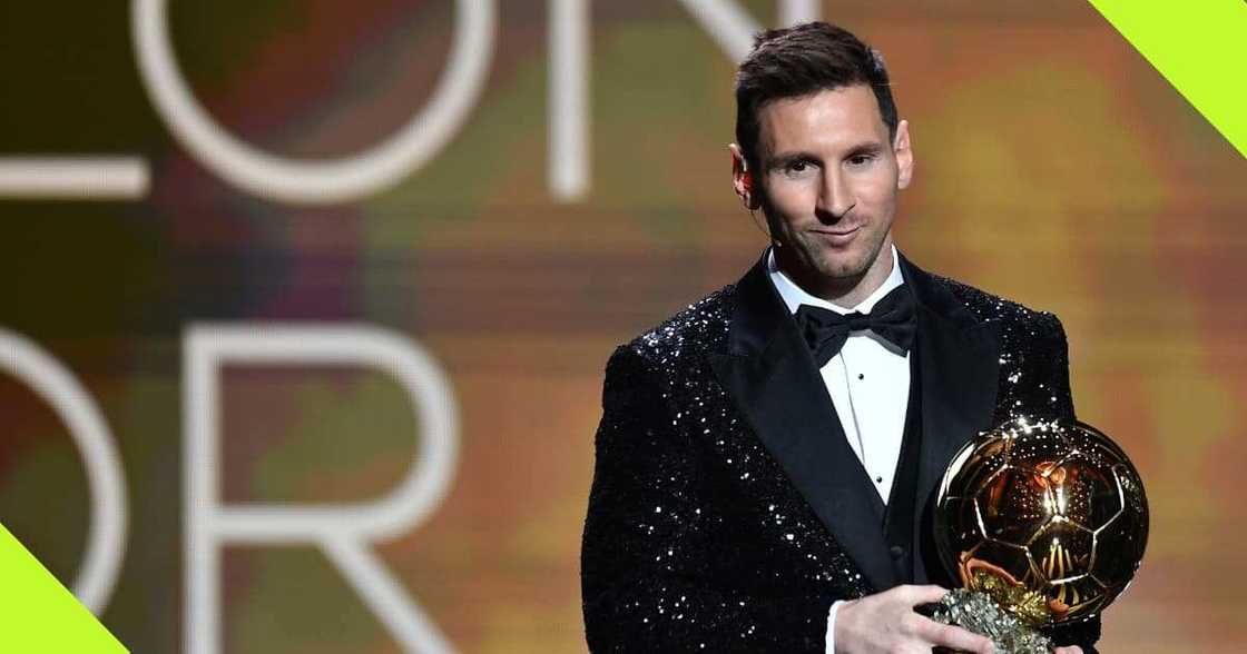 Lionel Messi with the Ballon d'Or award Lionel Messi with the Ballon d'Or award