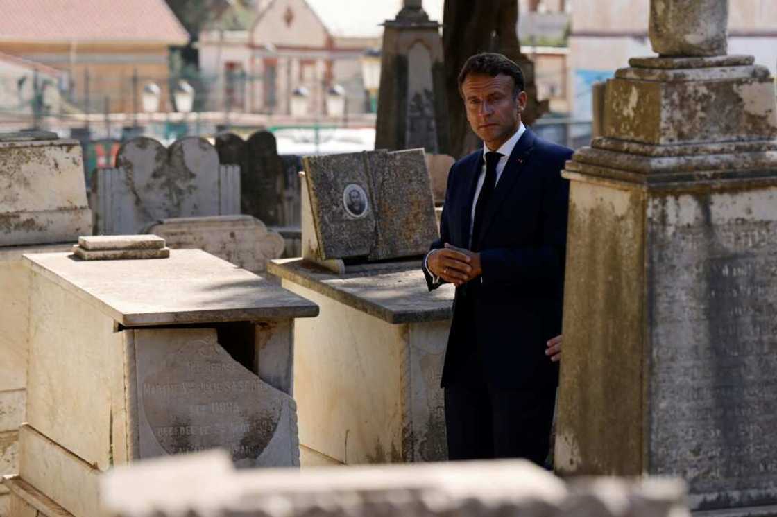 French President Emmanuel Macron visits the European Saint-Eugene Cemetery in Algiers on August 26, 2022, the second day of his visit to the former colony French President Emmanuel Macron visits the European Saint-Eugene Cemetery in Algiers on August 26, 2022, the second day of his visit to the former colony