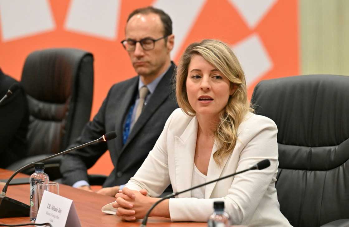 Canada's Foreign Minister Melanie Joly, pictured here at a November 14, 2024 meeting, is warning against a trade war with the United States under incoming President Donald Trump Canada's Foreign Minister Melanie Joly, pictured here at a November 14, 2024 meeting, is warning against a trade war with the United States under incoming President Donald Trump