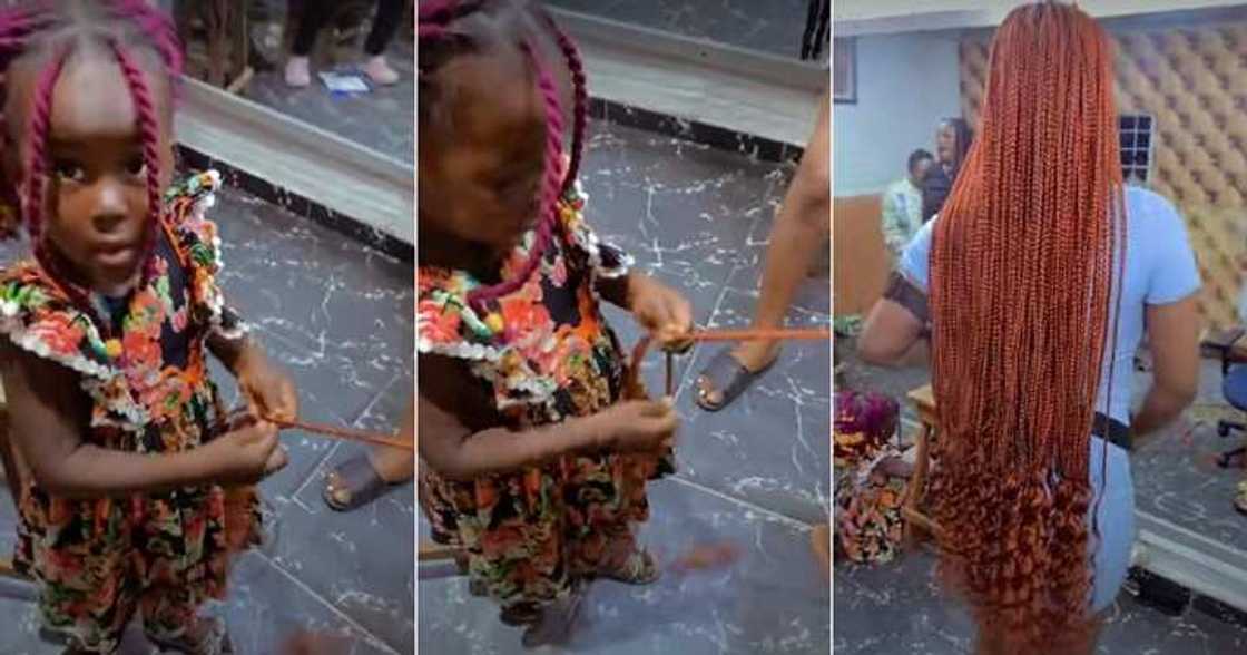 Little girl braids hair perfectly