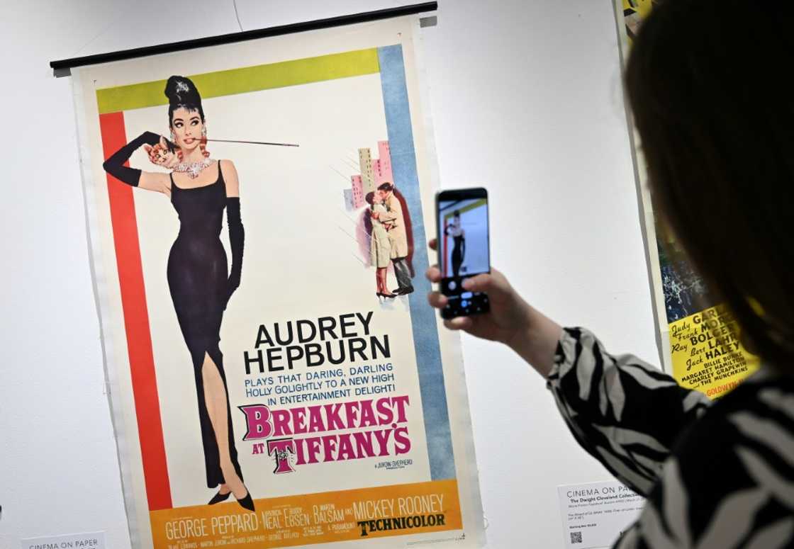 A poster from the 1961 film 'Breakfast at Tiffany's' starring Audrey Hepburn A poster from the 1961 film 'Breakfast at Tiffany's' starring Audrey Hepburn