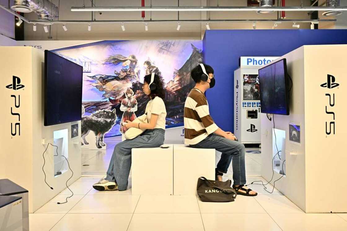 Eager gamers play Final Fantasy XVI in a Seoul store after the highly anticipated title went on sale Thursday Eager gamers play Final Fantasy XVI in a Seoul store after the highly anticipated title went on sale Thursday