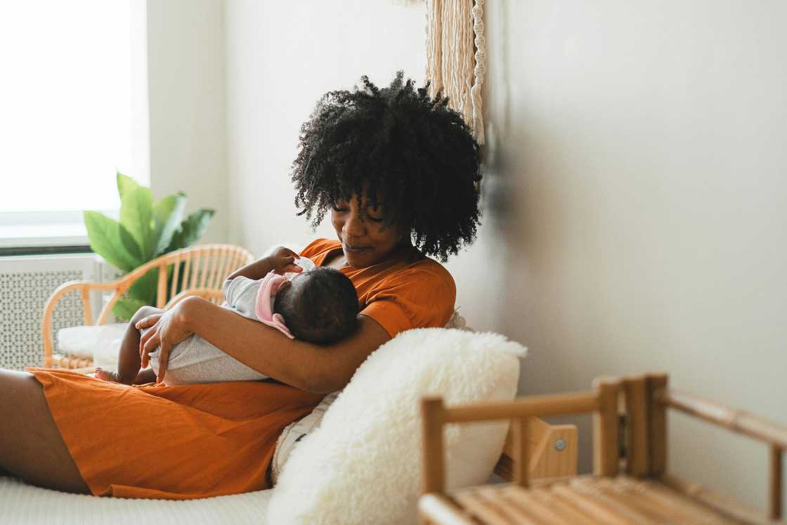 A mom nursing her baby