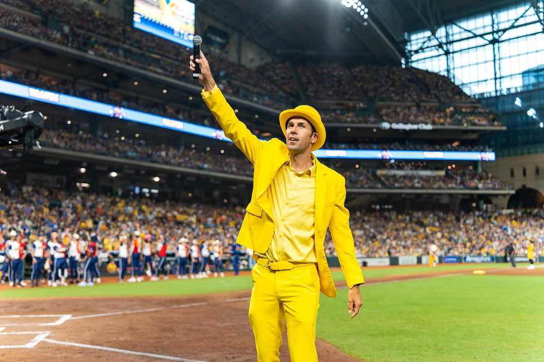 Jesse Cole holding a mic in the stadium Jesse Cole holding a mic in the stadium