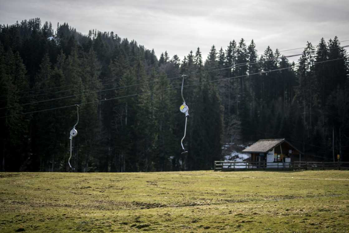 Ski lifts closed at the low-altitude resort of Les Paccots in the Swiss Pre-Alps in February 2024 due to a lack of snow