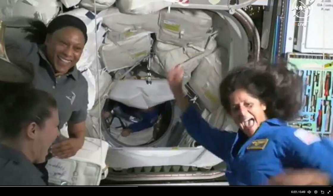 Astronaut Suni Williams, seen on the right, performed a short dance to celebrate her third arrival on the ISS Astronaut Suni Williams, seen on the right, performed a short dance to celebrate her third arrival on the ISS