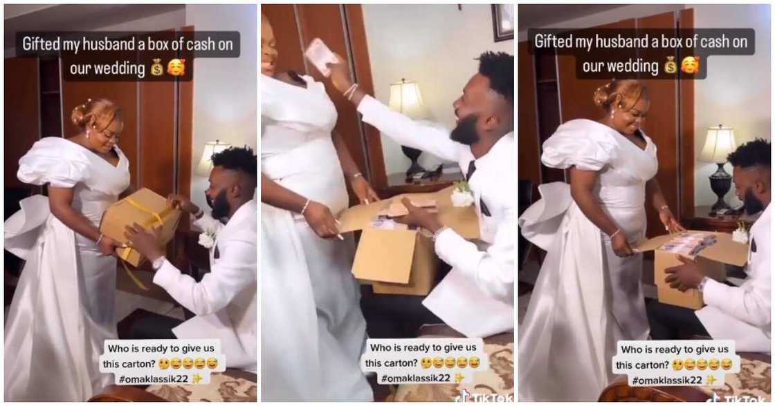 Bride gifts groom, box filled with cash, lovely couple moment on wedding day, bride gives groom box of cash Bride gifts groom, box filled with cash, lovely couple moment on wedding day, bride gives groom box of cash