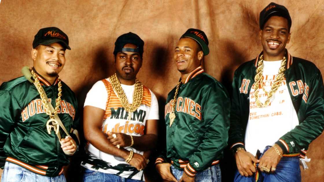 Members of the 2 Live Crew pose standing. Members of the 2 Live Crew pose standing.