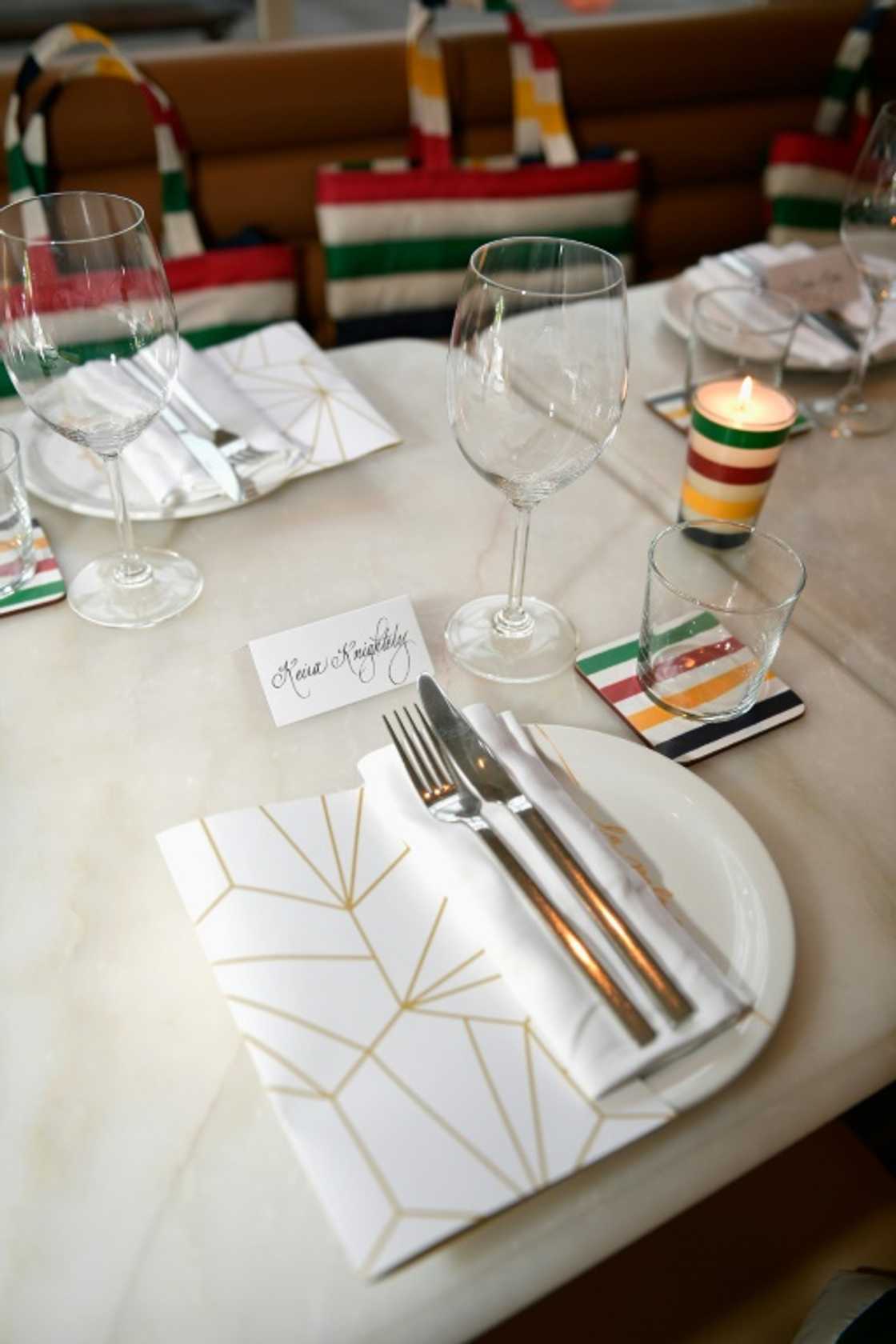 Hudson's Bay branded products with the company's iconic red, green yellow and blue stripes on display at its Toronto store in September 2018 Hudson's Bay branded products with the company's iconic red, green yellow and blue stripes on display at its Toronto store in September 2018