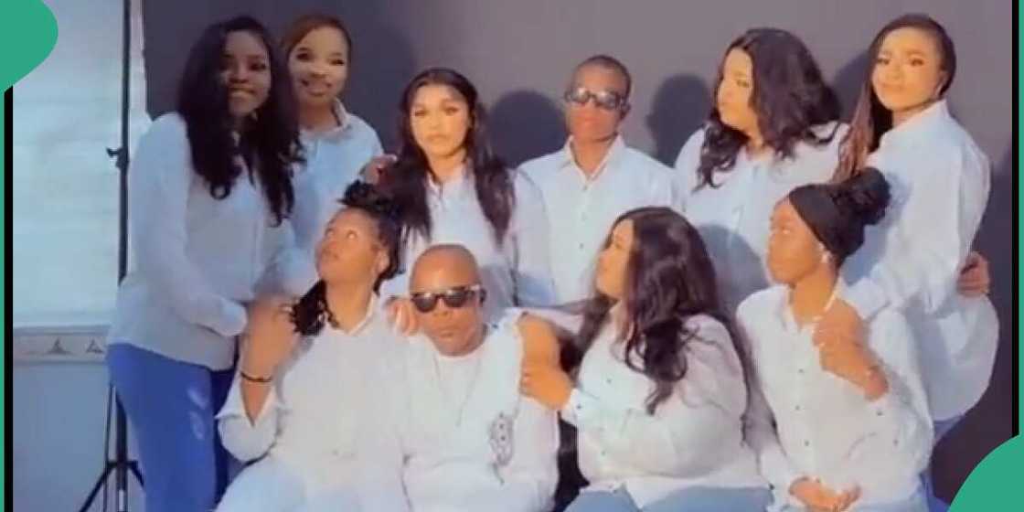 Man and his eight children. Man and his eight children.