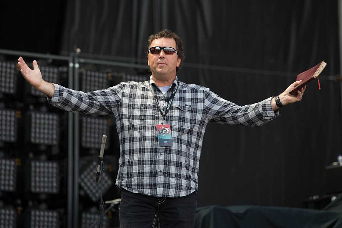 Alan Robertson of Duck Dynasty gives a sermon during RedFest at the Austin360 Amphitheater Alan Robertson of Duck Dynasty gives a sermon during RedFest at the Austin360 Amphitheater