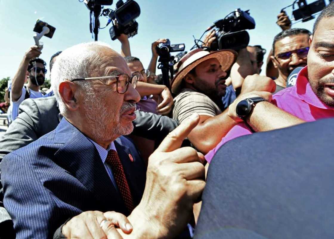 Rached Ghannouchi, head of Tunisia's Ennahda party, arrives at the office of Tunisia's counter-terrorism prosecutor in Tunis on July 19 Rached Ghannouchi, head of Tunisia's Ennahda party, arrives at the office of Tunisia's counter-terrorism prosecutor in Tunis on July 19