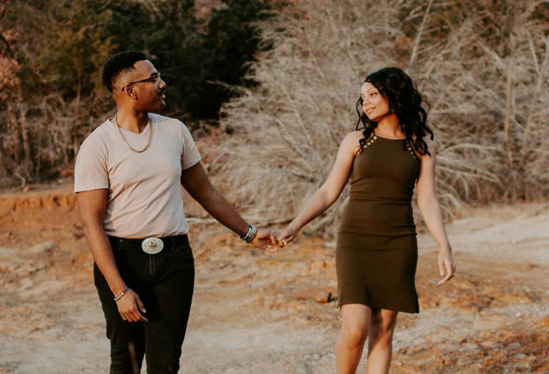 A happy couple holding hands A happy couple holding hands