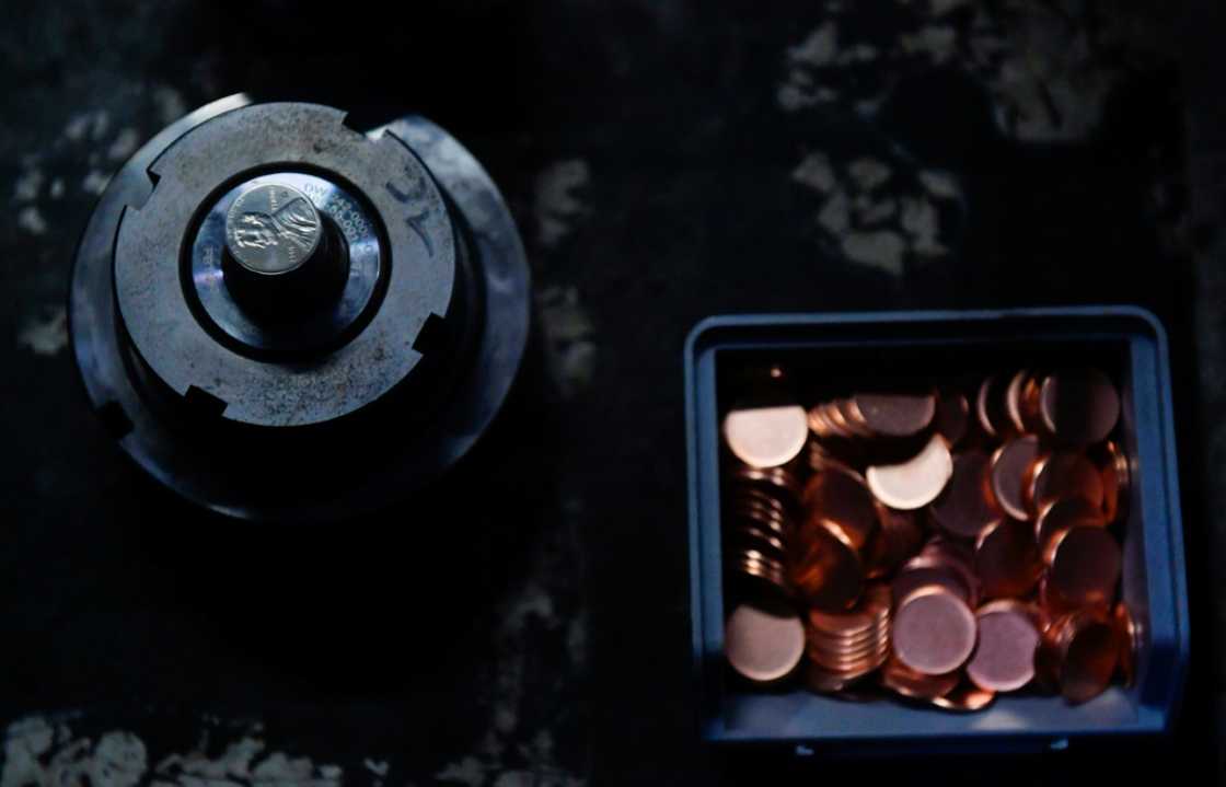 The dies used to press the last pennies along with the planchets, or blank disks that will become coins, at the US Mint