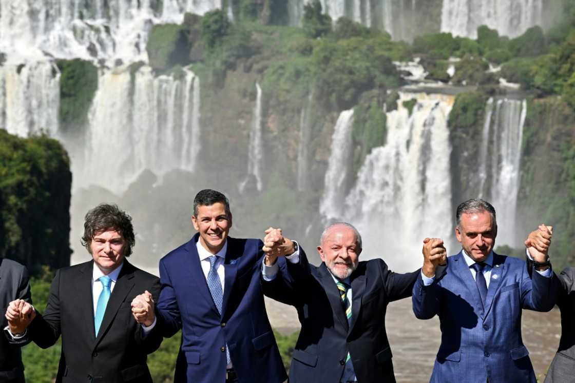 (L to R) Argentina's President Javier Milei, Paraguay's Santiago Pena, Brazil's Luiz Inacio Lula da Silva and Uruguay's Yamandu Orsi pose for a family photo at the Mercosur summit (L to R) Argentina's President Javier Milei, Paraguay's Santiago Pena, Brazil's Luiz Inacio Lula da Silva and Uruguay's Yamandu Orsi pose for a family photo at the Mercosur summit