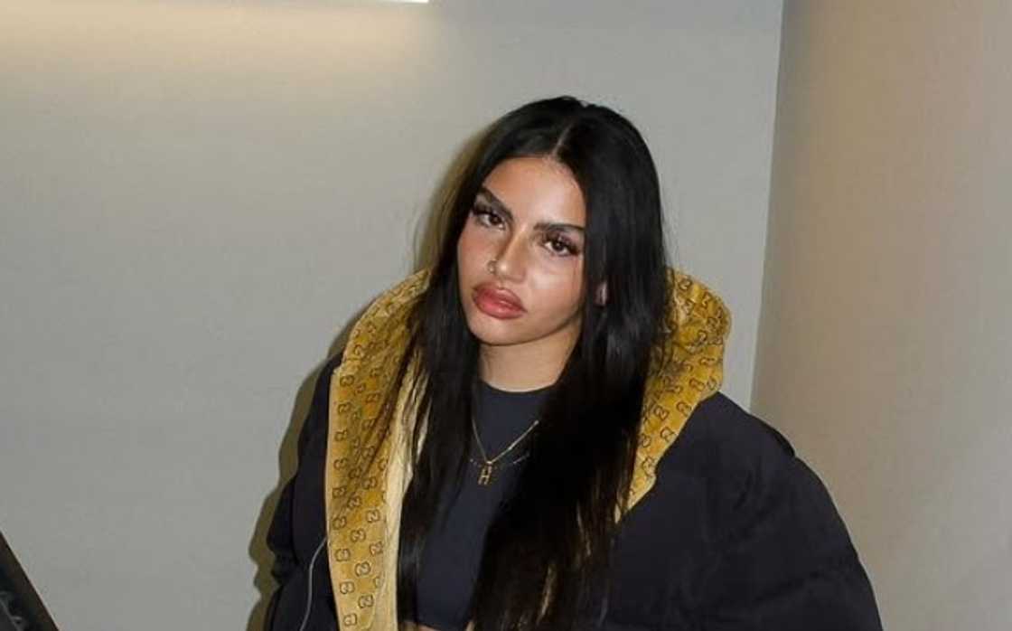 Huda Love Island wearing a black and brown coat Huda Love Island wearing a black and brown coat