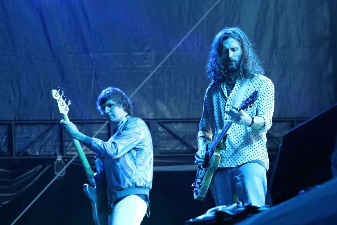 Nikolai Fraiture and Nick Valensi of The Strokes perform at a concert in Ontario Nikolai Fraiture and Nick Valensi of The Strokes perform at a concert in Ontario