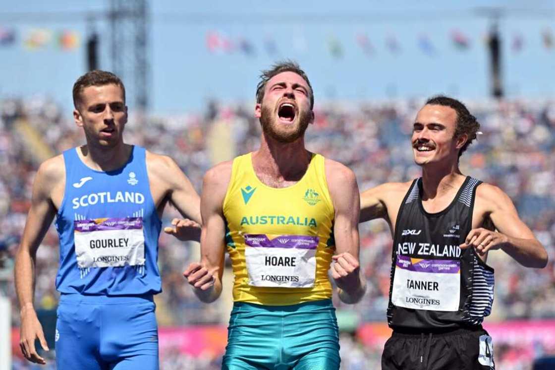 Australia's Oliver Hoare (centre) celebrates victory in the final of the men's 1500m at the Commonwealth Games