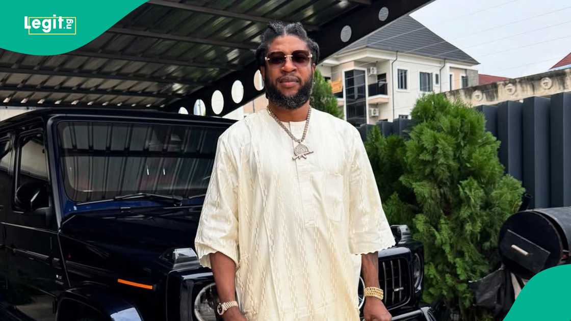 Socialite and realtor Abu Abel seen conversing with cleric as he attends church service.