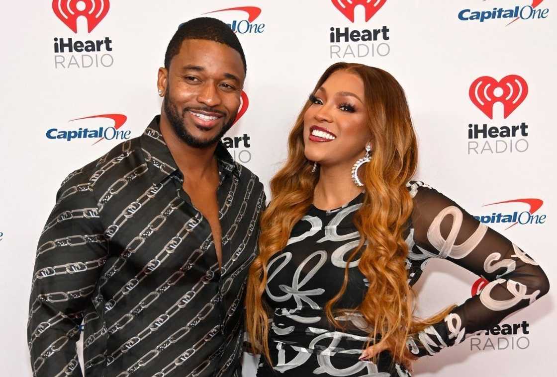 Drew Sidora and Ralph Pittman pose on the red carpet at the iHeartRadio Music Festival Drew Sidora and Ralph Pittman pose on the red carpet at the iHeartRadio Music Festival