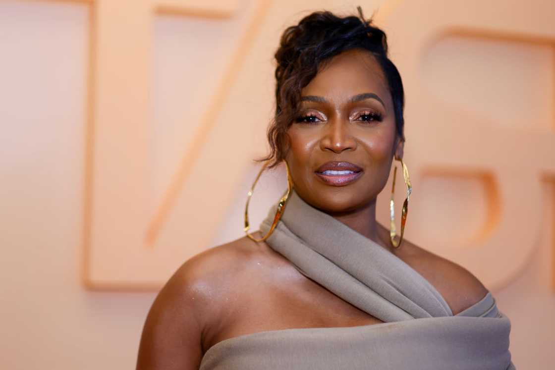 Marlo Hampton posing for a photo in a grey ensemble at the Meals On Wheels Atlanta's TASTE Marlo Hampton posing for a photo in a grey ensemble at the Meals On Wheels Atlanta's TASTE