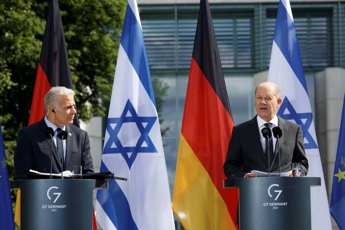 German Chancellor Olaf Scholz and Israeli Prime Minister Yair Lapid (L) hold a joint press conference after talks in Berlin, Germany, on September 12, 2022