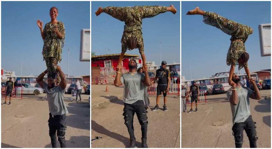 Pretty lady and an energetic young man perform street acrobatic moves.