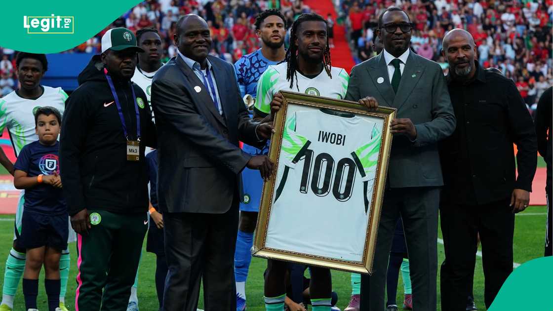 Alex Iwobi receives a shirt congratulating him for his 100th match for Nigeria National Team before the start of the International Friendly match against Portugal in June 2026. Photo by Gualter Fatia