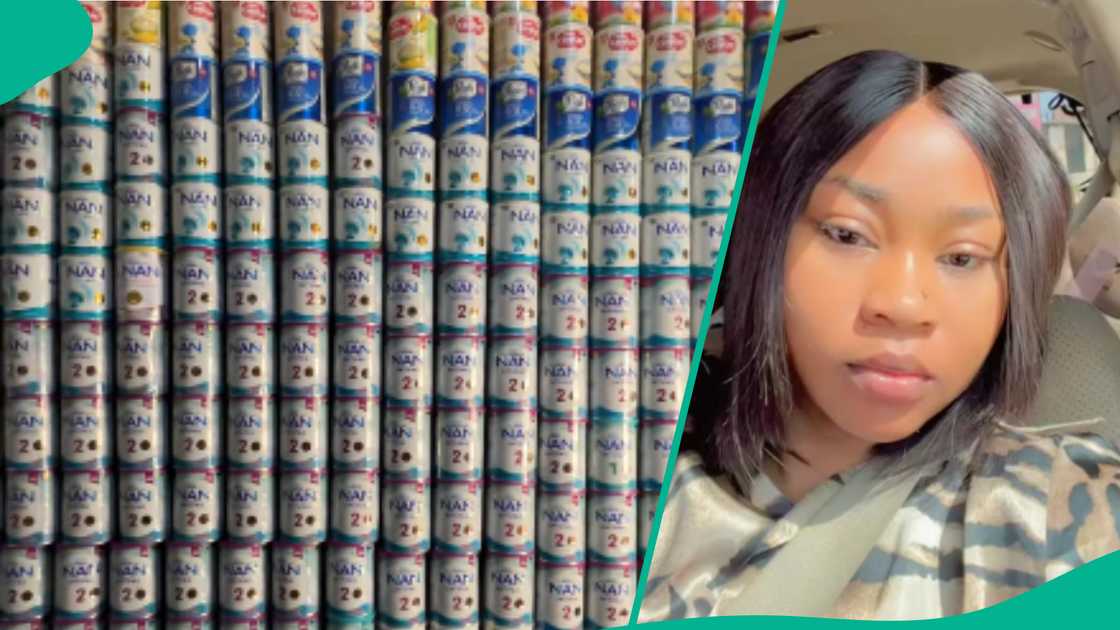 Woman shows milk her children consumed in a year. Woman shows milk her children consumed in a year.