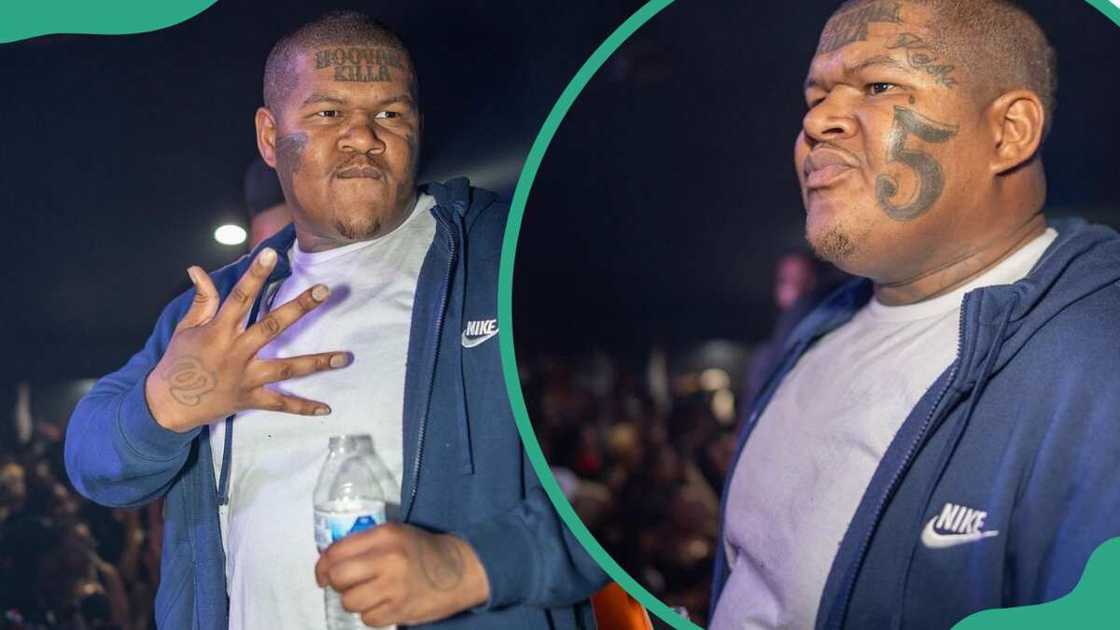 Crip Mac holding a bottle of water while wearing a Nike jacket. Crip Mac holding a bottle of water while wearing a Nike jacket.